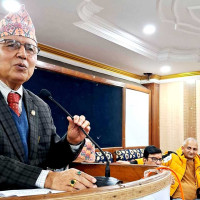 Parbat farmers busy harvesting paddy