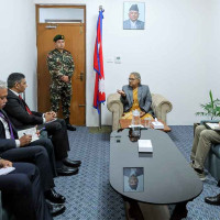 Women worker helps on gravel crushing in Jajarkot