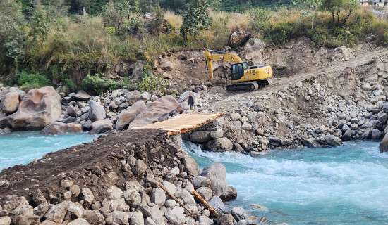 Temporary wooden motorable bridge built over Tamor River