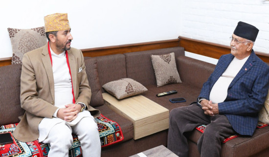 CPN (UML) Chair Oli and Communication Minister Kharel meet