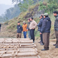 Minister Kharel meets top party  leaders, vows timely polls