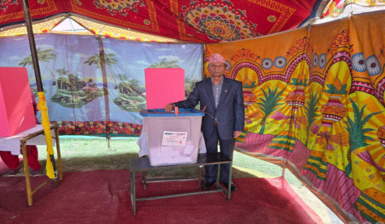 Former chair of Council of Ministers, Khil Raj Regmi, casts his vote