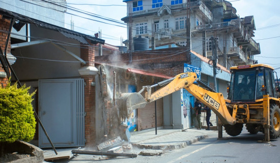 Bajura locals start rebuilding demolished Chhaupadi huts